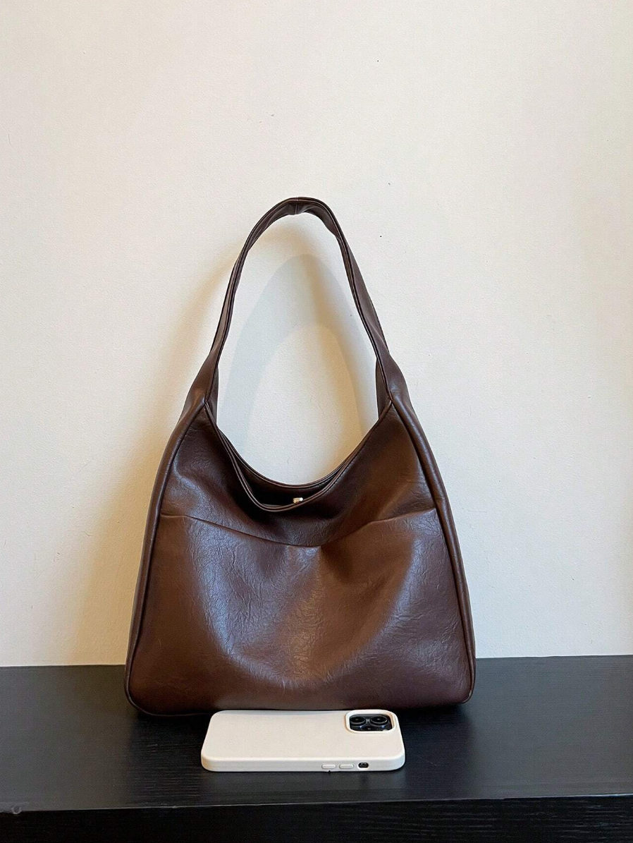 Dark brown handbag