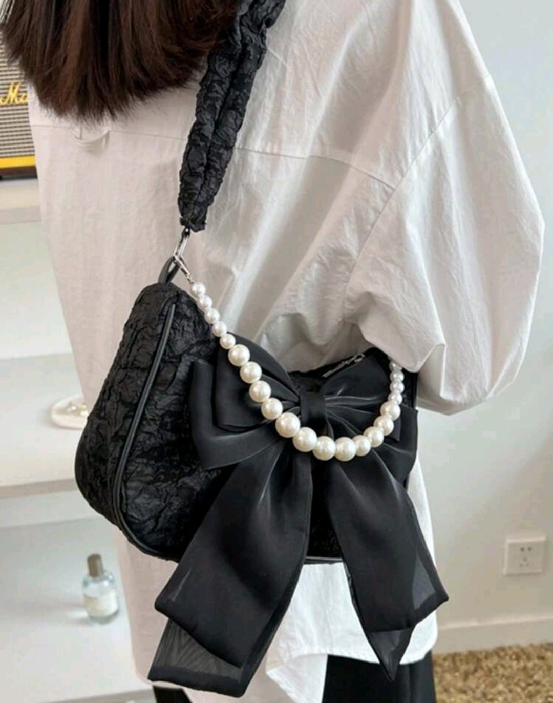 Black lace handbag