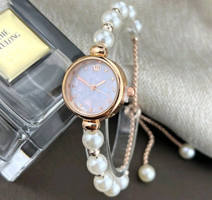 Elegant Rose Gold Quartz Watch with Mother of Pearl Dial and Adjustable Metal Strap for Women - Kamuxury
