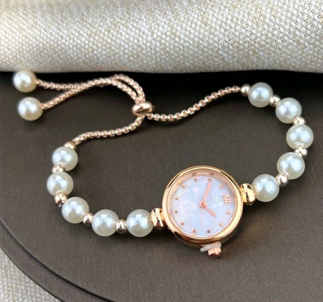 Elegant Rose Gold Quartz Watch with Mother of Pearl Dial and Adjustable Metal Strap for Women