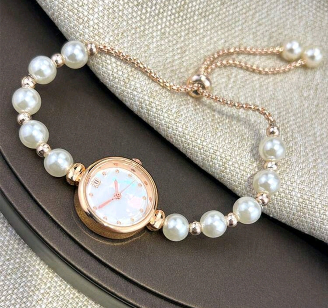 Elegant Rose Gold Quartz Watch with Mother of Pearl Dial and Adjustable Metal Strap for Women