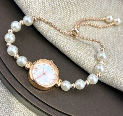 Elegant Rose Gold Quartz Watch with Mother of Pearl Dial and Adjustable Metal Strap for Women - Kamuxury
